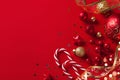 Christmas card or banner. Christmas decorations on red background