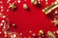 Christmas card or banner. Christmas golden decorations on red background