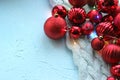 Christmas card. Beautiful Christmas background. Lots of red balls big and small on blue texture background. White snowflakes circl Royalty Free Stock Photo