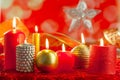 Christmas card candles red and golden in a row Royalty Free Stock Photo