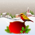 Christmas card with colorful bird in the foreground with holly branch and berries and in the background a small village. Snowing w Royalty Free Stock Photo