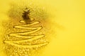 Christmas card with copyspace for your text. Gold glitter background with painted fir-tree. Shiny texture for party. New Year