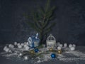 Christmas card with decorative Christmas toys with strong snow on the Black wooden background Royalty Free Stock Photo