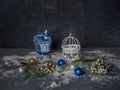 Christmas card with decorative Christmas toys with strong snow on the Black wooden background Royalty Free Stock Photo