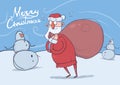 Christmas card of funny confused Santa Claus with big bag standing next to snowmen in frosty windy weather. Santa looks