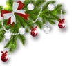 Christmas card. Green branches of a Christmas tree with silver, red balls and ribbon Royalty Free Stock Photo