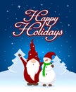 Christmas card `Happy Holidays` with a cute dwarf who greets and hugs a snowman in a snowy evening landscape Royalty Free Stock Photo