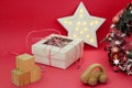 Christmas card with Holiday decor, wreath and presents for Kids top view banner. Ecological Baby toys flatly