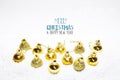 Christmas card, illustration with golden baubles, balls, decorations, ornaments on a silver white background with blurry, blurred Royalty Free Stock Photo