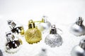 Christmas card, illustration with golden baubles, balls, decorations, ornaments on a silver white background with blurry, blurred Royalty Free Stock Photo