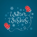 Christmas card. knitted woolen mittens and congratulatory hand lettering