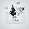 Christmas card with paper snowflakes and Christmas trees inside open envelope. Paper elements in black style Royalty Free Stock Photo