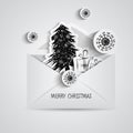 Christmas card with paper snowflakes and Christmas trees inside open envelope. Paper elements in black style Royalty Free Stock Photo