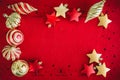 Christmas Card Red background with golden decorations, Balls and Stars, and space for your Text Royalty Free Stock Photo