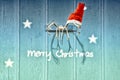 Christmas card with reindeer antlers and santas hat Royalty Free Stock Photo