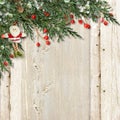 Christmas card with Santa and red berries on vintage wooden. Royalty Free Stock Photo