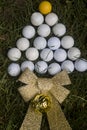 Christmas card simulating tree with golf balls Royalty Free Stock Photo