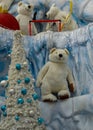 Christmas card, three polar bears and a Christmas tree. Spruce with toys, toy bears all form a Christmas composition