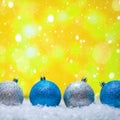 Christmas card.Christmas Toys in the snow with a bright background and falling snow. Square photo. Instagram