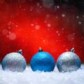 Christmas card.Christmas Toys in the snow with a bright background and falling snow. Square photo. Instagram