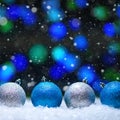 Christmas card.Christmas Toys in the snow with a bright background and falling snow. Square photo. Instagram