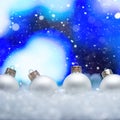 Christmas card.Christmas Toys in the snow with a bright background and falling snow. Square photo. Instagram