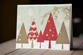 Christmas card with Christmas trees made by hand using the applique method, AI generation