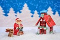 Christmas card with red house, Santa and Bunny and it`s snowing