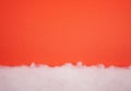 Christmas card with white cotton texture snow blanket, is soft, fluffy wadding, cotton at red background