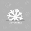 Christmas card, white paper snowflakes on gray background Royalty Free Stock Photo