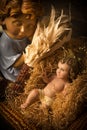 Christmas cards. Baby Jesus care by an angel Royalty Free Stock Photo