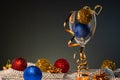 Christmas cards. Wine glass with red, blue and gold Christmas decorations