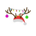 Christmas carnival mask with reindeer antlers, Santa Claus red hat with deer horns new year balls and christmas lights Royalty Free Stock Photo