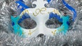 Christmas carnival mask on a silver tinsel background. Christmas masque with christmas tinsel .