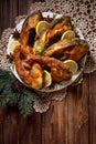 Christmas carp, Fried carp fish slices on a ceramic plate on the holiday table