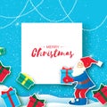 Christmas cartoon of Santa Claus holding a Gift box with bow. Paper Cut Merry Christmas Greeting card. Origami Happy New Royalty Free Stock Photo