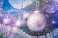 Christmas-tree decoration bauble on decorated Christmas tree bac Royalty Free Stock Photo