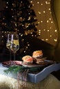 Christmas champagne with red fish appetizer and Christmas tree