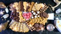 Christmas charcuterie board with gingerbread, chocolate and shortbread cookies.