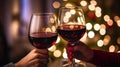 Christmas Cheer: Pair Toasting Red Wine Royalty Free Stock Photo