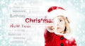 Christmas Child in Red Santa Hat Ponting to Christmas Royalty Free Stock Photo