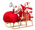 Christmas Child screaming Megaphone, delivering Xmas Gifts, Huge Bag full with Presents. Little Girl Elf in Santa Hat riding