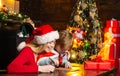 Christmas Child son and mother Write Letter to Santa Claus. Lovely mother is writing a letter to Santa with her son Royalty Free Stock Photo