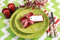 Christmas children family party table place settings in lime green, red and white Royalty Free Stock Photo