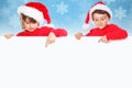 Christmas children kids Santa Claus pointing empty banner snow c