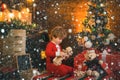 Christmas childs in snow. Childhood memories. Santa boy little child celebrate christmas. Boy child play near christmas