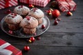 Christmas chocolate delicious muffins served on black ceramic plate