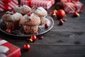 Christmas chocolate delicious muffins served on black ceramic plate