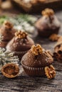 Christmas chocolate delicious muffins sprinklad with sugar powder and wallnut on top