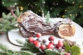 Christmas chocolate log, Buche de Noel, festive holiday cake and decorations